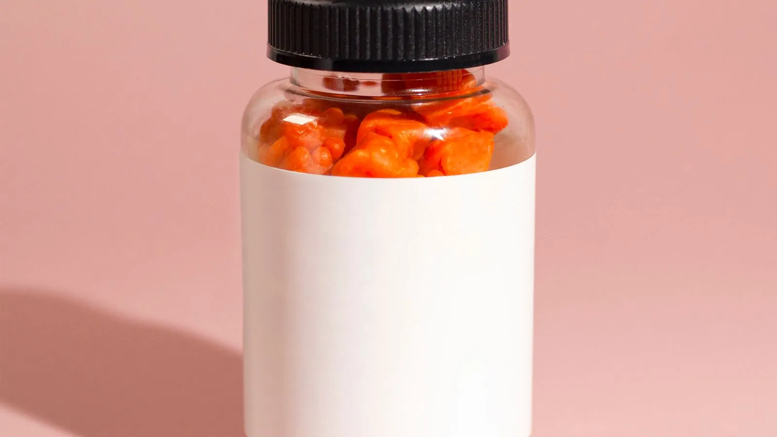 A bottle of colorful vitamin gummies